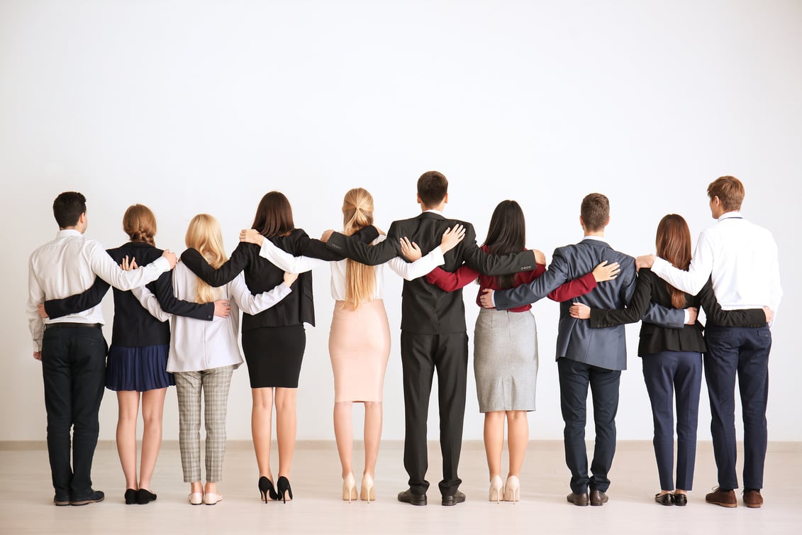 People Standing Together Indoors